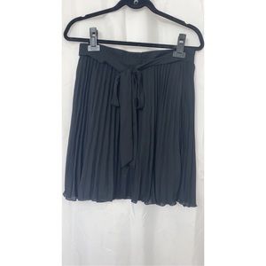 Black flowy pleated skirt with bow tie